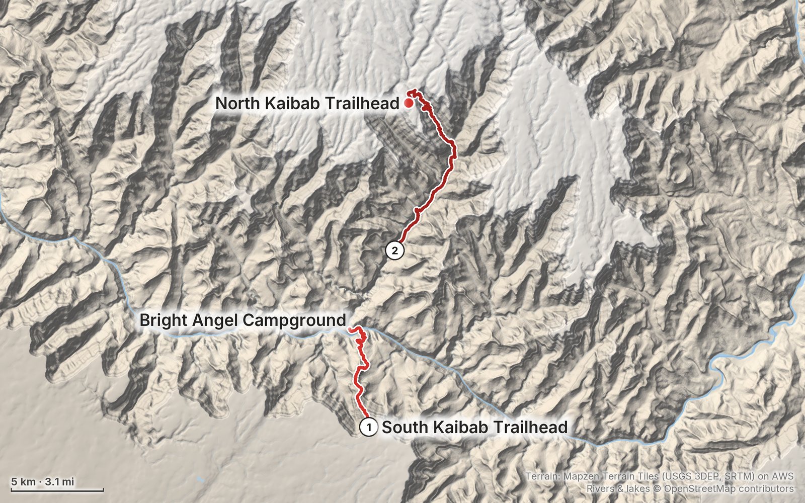 Relief map of the Grand Canyon Rim to Rim route: 2 days drawn in red with numbered day starts, labelled South Kaibab Trailhead, North Kaibab Trailhead and Bright Angel Campground.