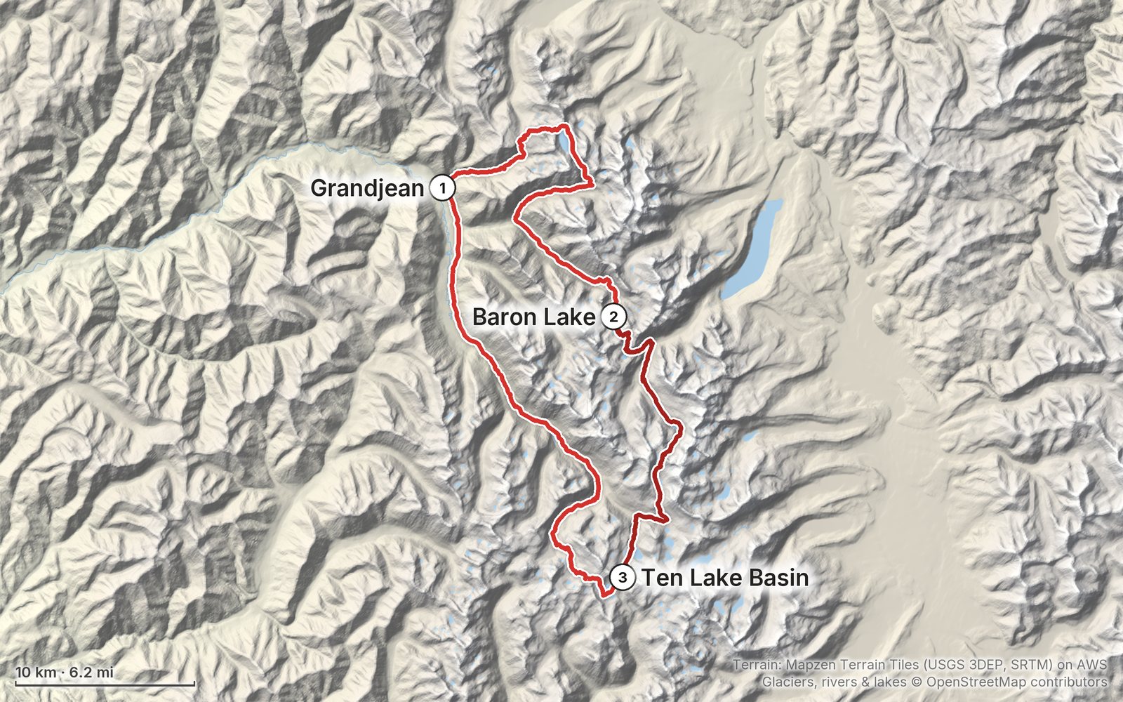 Relief map of the Sawtooth Wilderness Loop route: 3 days drawn in red with numbered day starts, labelled Grandjean, Ten Lake Basin and Baron Lake.