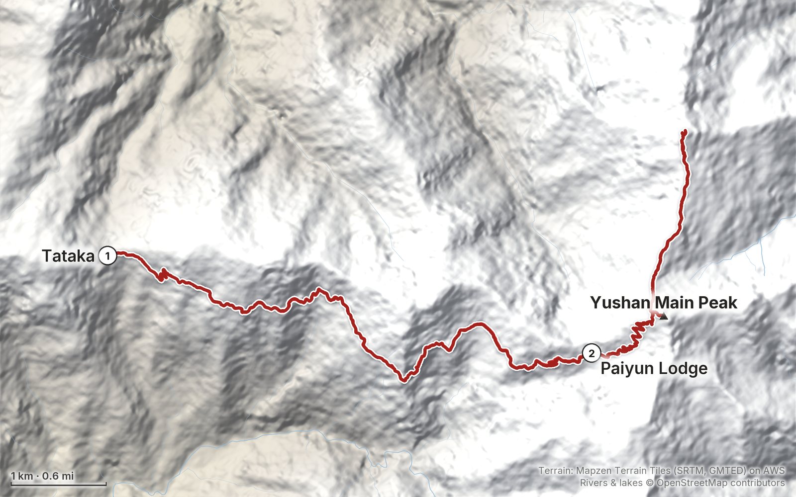 Relief map of the Yushan route: 2 days drawn in red with numbered day starts, labelled Tataka, Yushan Main Peak and Paiyun Lodge.