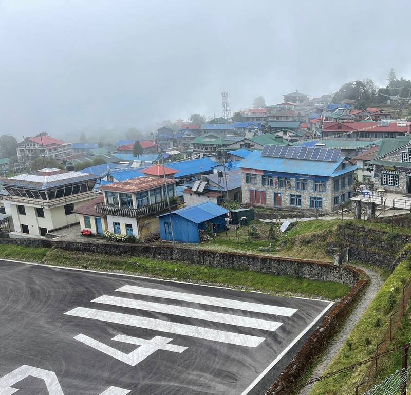 Lukla's airstrip and the town, on the afternoon Day 1 starts.