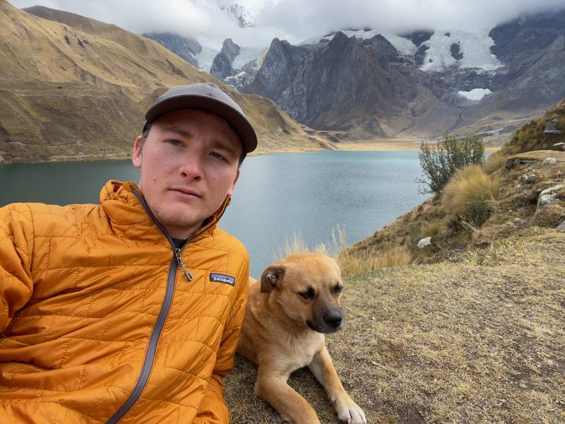 Me with Free Solo, the dog that hiked with us every step, at Carhuacocha on Day 3.