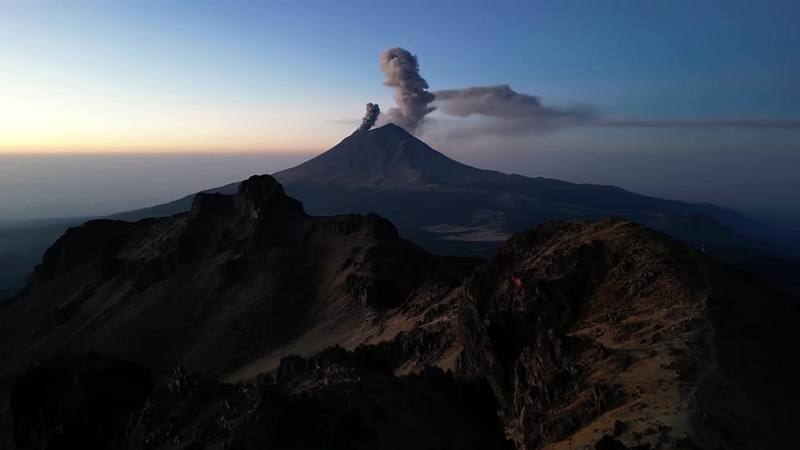 Popocatépetl puffing ash at dawn, from my drone above the ridge near the hut, Day 2.