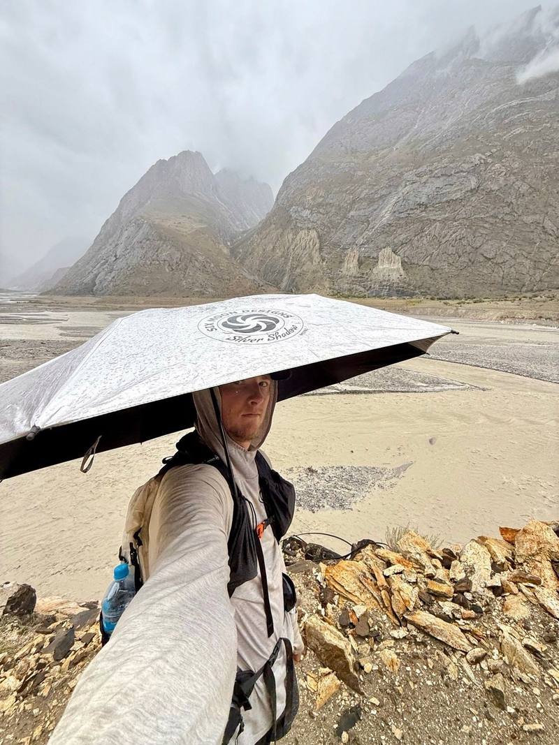 Rain on Day 1, and the umbrella came out.