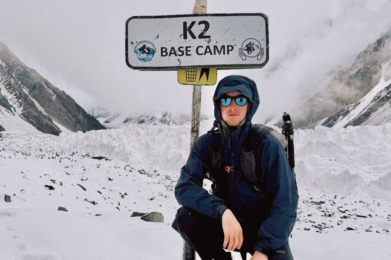 Me at the K2 Base Camp sign on Day 7.