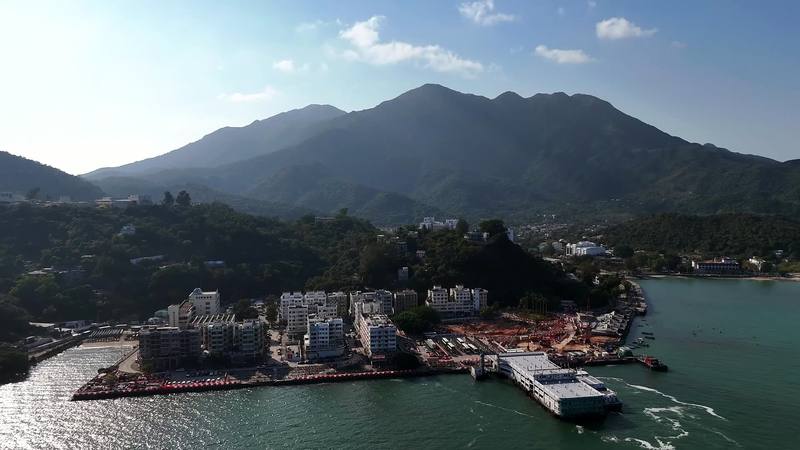 Mui Wo and its ferry pier, with Lantau's mountains behind: where the trail starts.