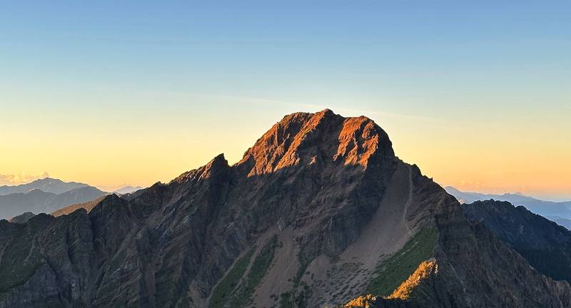 The Main Peak in the first sun, from North Peak at 5:55 a.m. on Day 2.