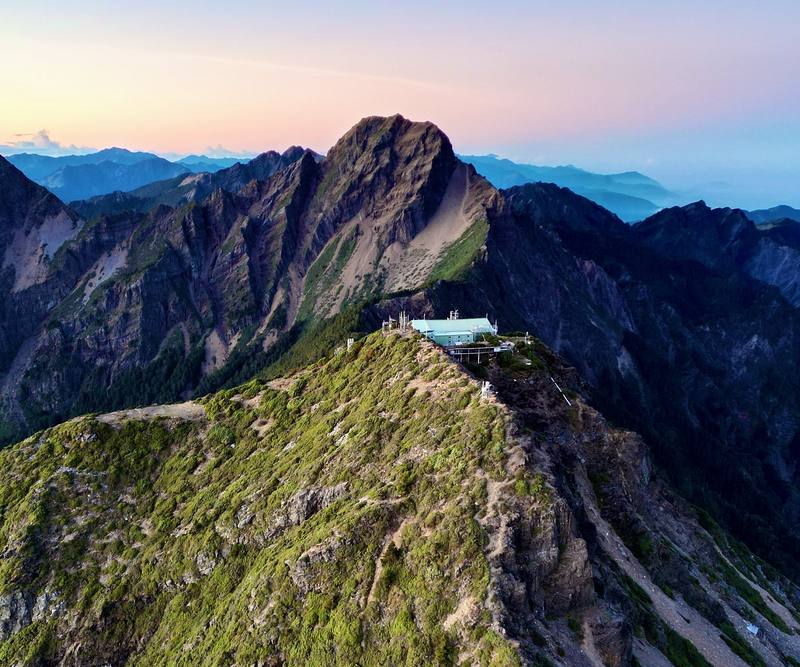 North Peak's weather station and the Main Peak behind it at dawn, from my drone, Day 2.